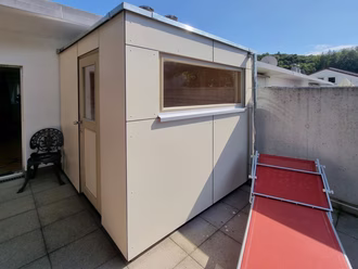 sauna-auf-terrasse-mit hpl-fassade-beige